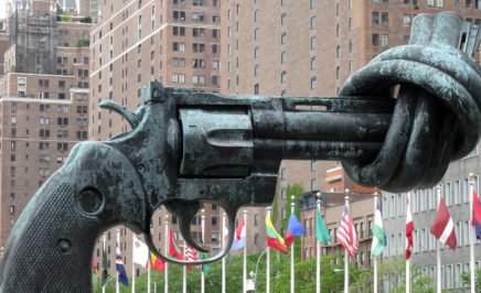 A sculpture of a 45-caliber revolver with its barrel knotted outside the UN in New York, USA.