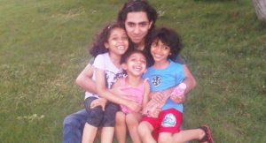 Raif Badawi with his kids