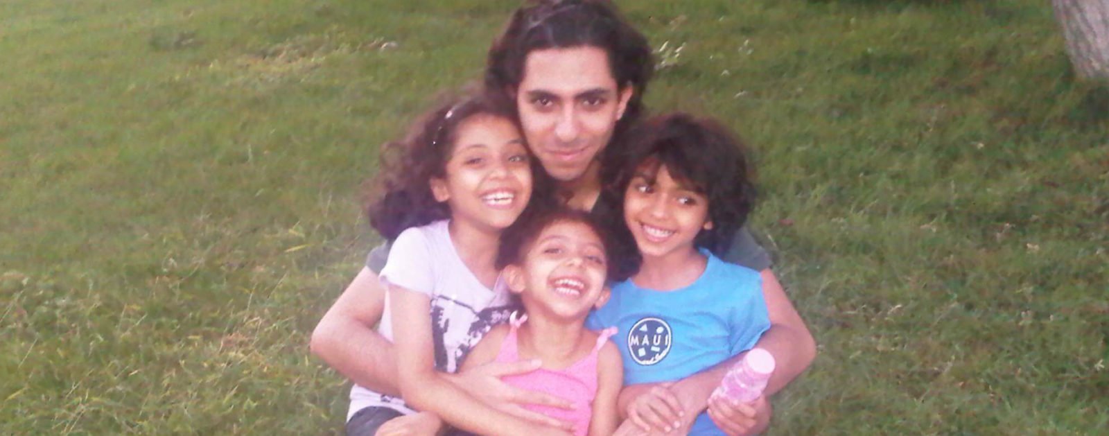 Raif Badawi with his kids