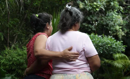 María Teresa Rivera's mother-in-law and neighbor.