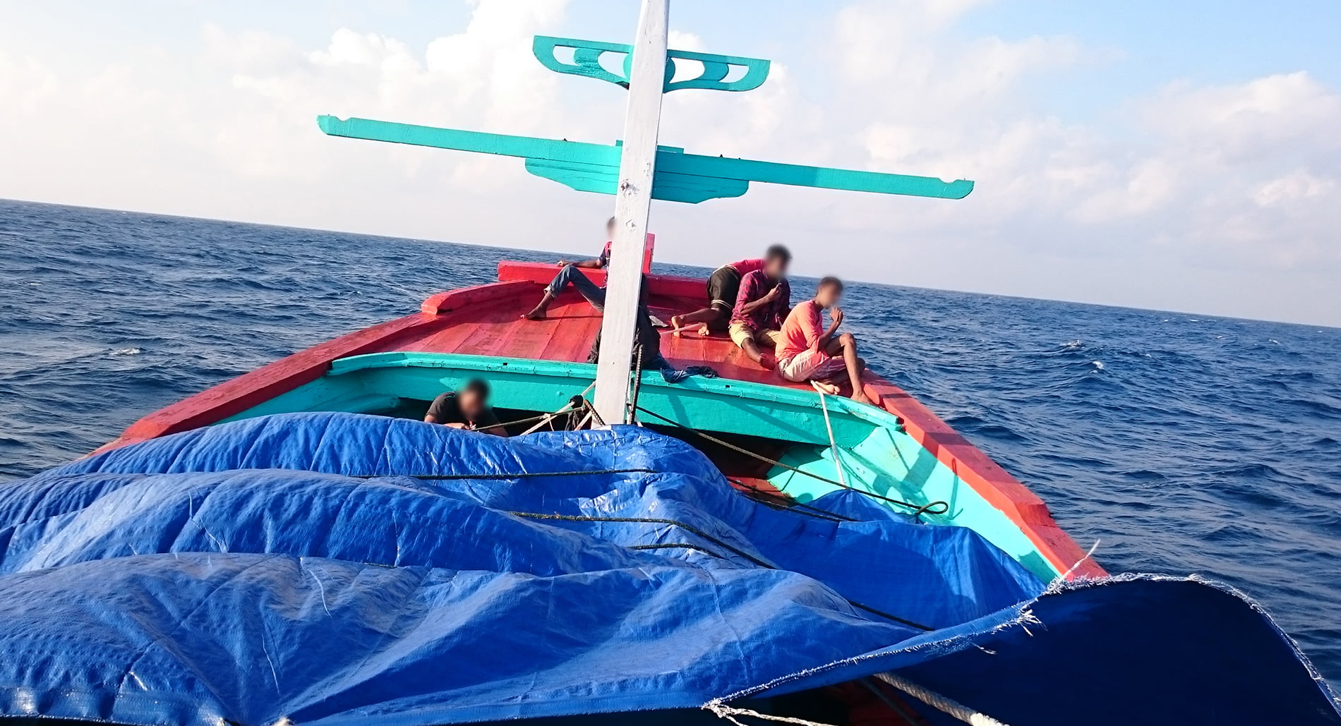Asylum-seekers on board a boat prior to being intercepted and turned back by Australian officials