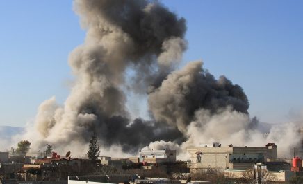 Smoke rising after a barrel bomb attack in Daraya, Syria