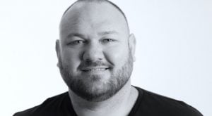 Black and white photo of man on white background