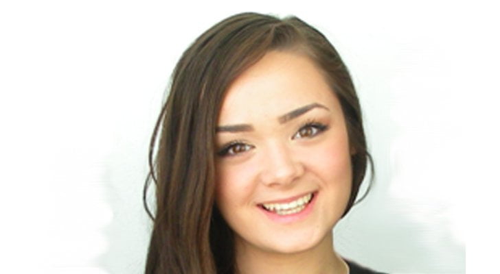 Woman smiling on white background