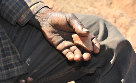 Hand of Aboriginal man in Utopia.