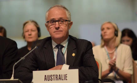 Prime Minister Malcolm Turnbull in front of a placeholder that reads 'Australie'. © Flickr/Veni