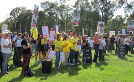 Supporters of Amnesty International Australia and the Refugee Action Committee Canberra at Parliament House lawns oppose the proposed Lifetime Ban bill.