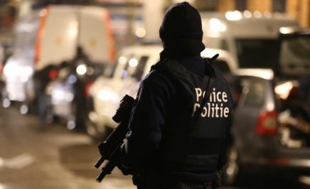 Police officers take part in an operation in Brussels