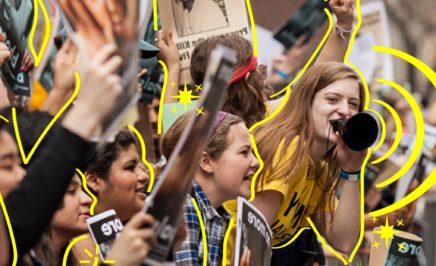 A young women protests at a rally. The women are outlined by yellow lines.