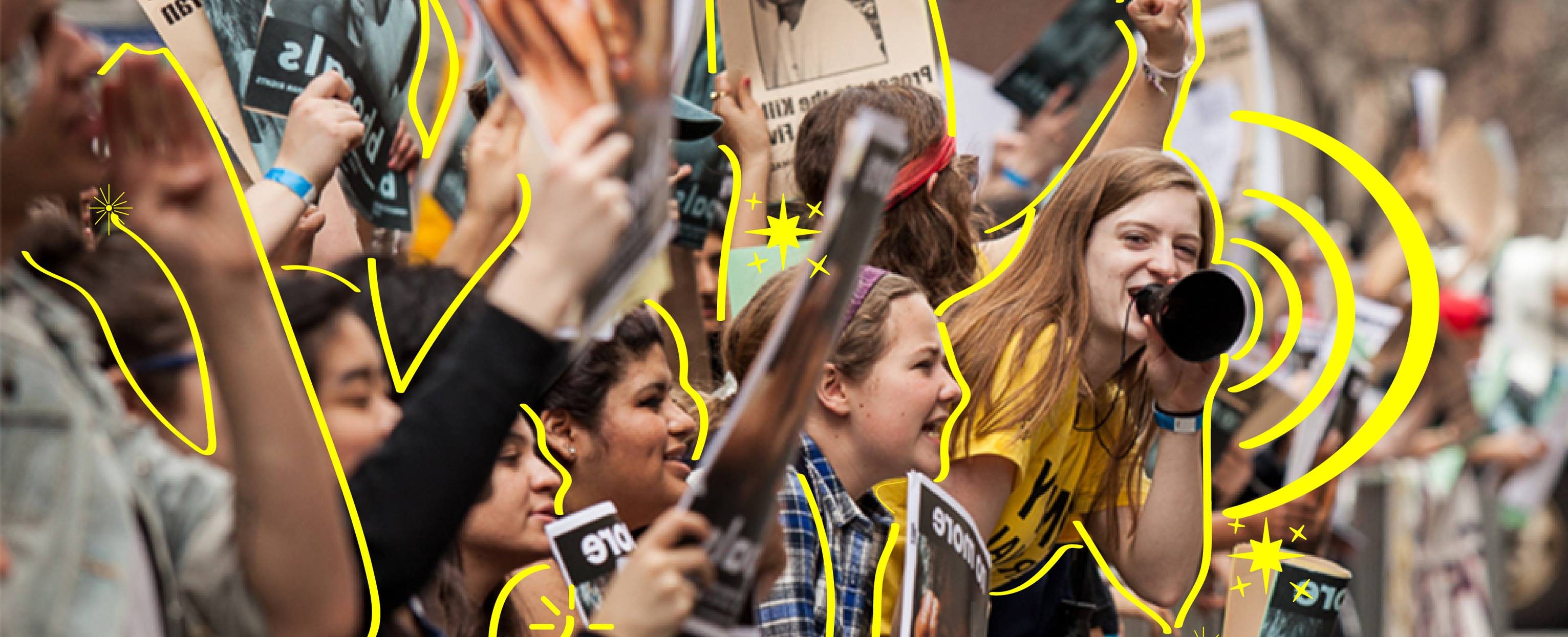 A line of young impassioned women protesting at a rally with raised fists and megaphones. The women are outlined by yellow lines.