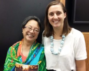 Indigenous Rights Campaigner Roxanne Moore with the UN Special Rapporteur on the Rights of Indigenous Peoples, Victoria Tauli-Corpuz, holding the Community is Everything ‘Heads Held High’ report. © AIA 2017