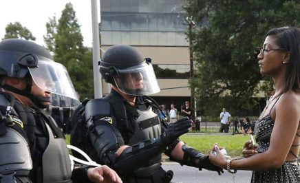 A demonstrator protesting the shooting death of Alton Sterling.