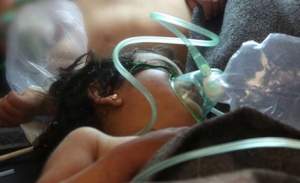 Syrian children receive treatment at a small hospital in the town of Maaret al-Noman following a suspected toxic gas attack