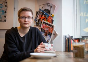Sakris Kupila a 20 year-old medical student, a youth activist and a defender of transgender rights from Finland. sits in a coffee shop.