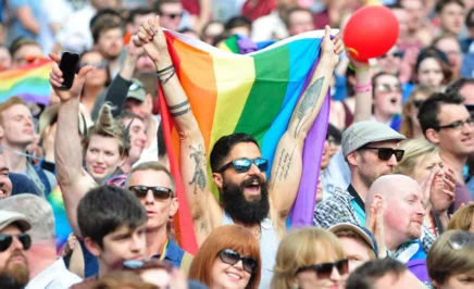 Crowd with rainbow flags