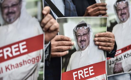 Protestors hold pictures of missing journalist Jamal Khashoggi during a demonstration in front of the Saudi Arabian consulate on 8 October 2018.