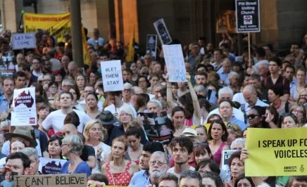 A crowd gathers in Sydney to protest the treatment of refugees and asylum seekers, February 2016.
