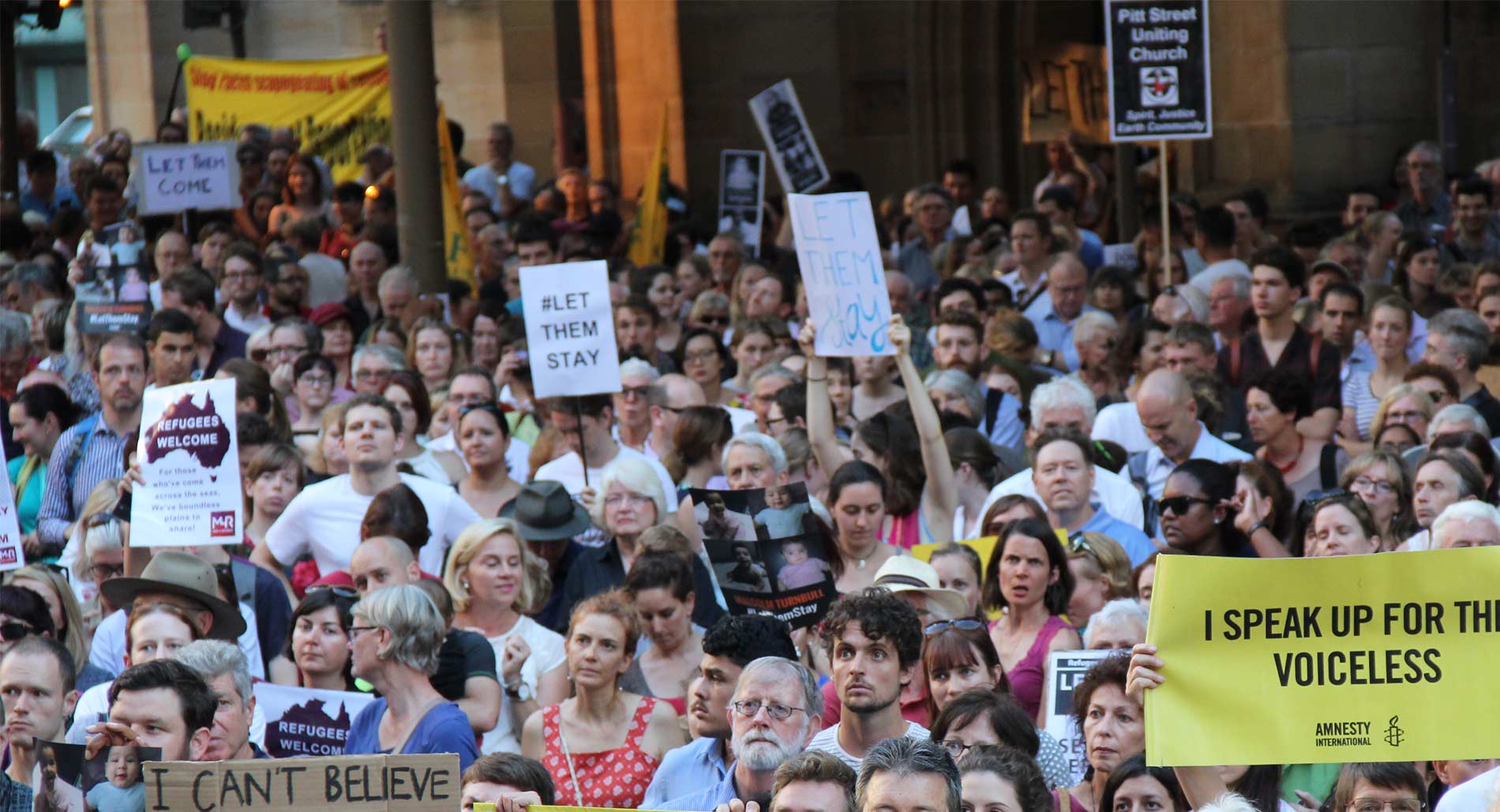 A crowd gathers in Sydney to protest the treatment of refugees and asylum seekers, February 2016.