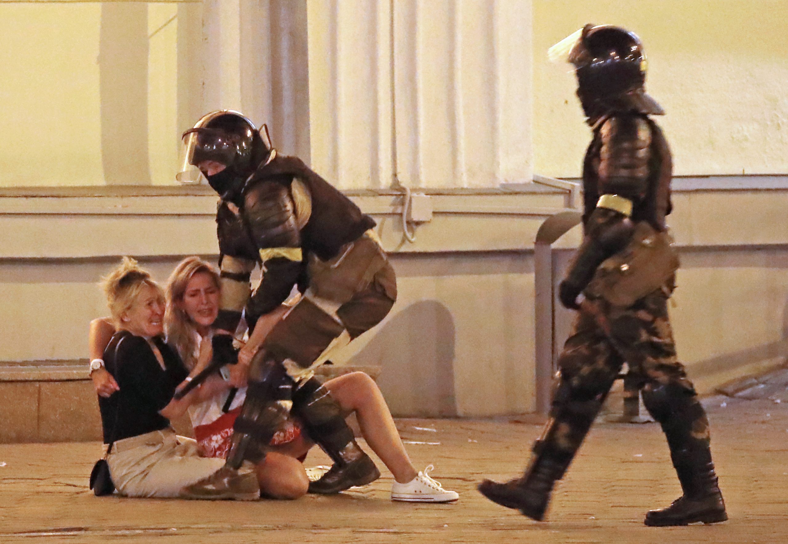 Police officers detain participants in a protest against the results of the 2020 Belarusian presidential election. According to the Central Election Commission of Belarus, incumbent president Alexander Lukashenko gets 80.08% of the votes, with Sviatlana Tsikhanouskaya polling 10.09%. Mass protests erupted in major cities across Belarus in the evening of August 9.