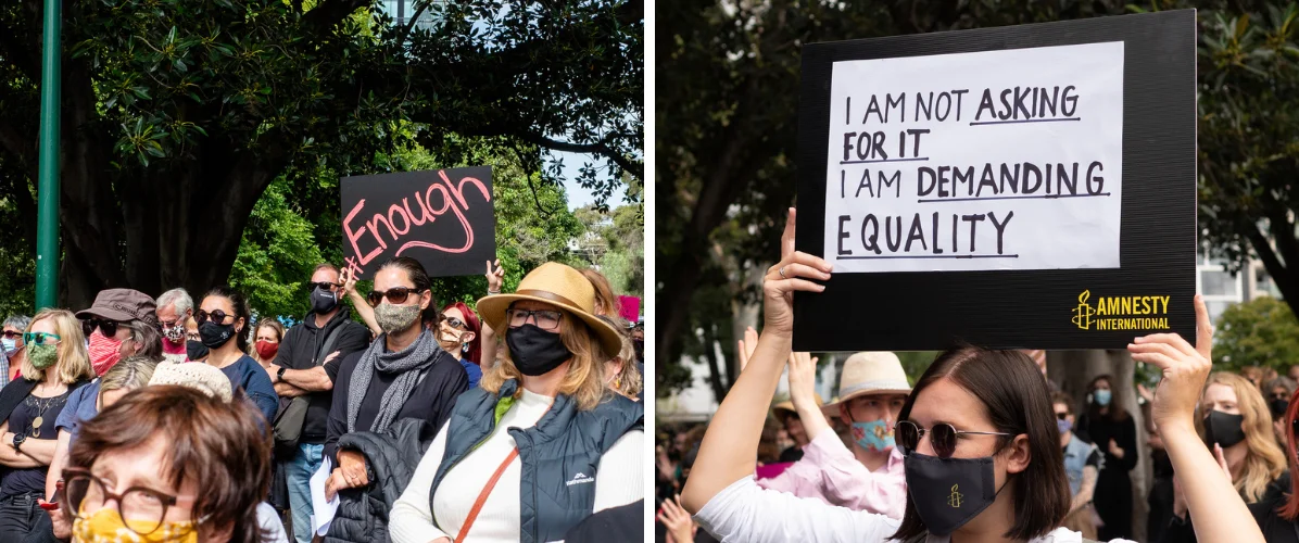 Group of young women activists in Melbourne CBD walking together during a March4Justice protest. One protester holds up a sign saying 